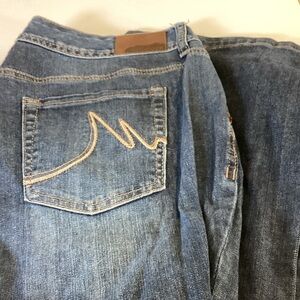 Dark Blue Maurice’s Jeans.